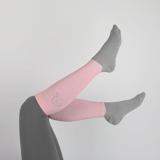 image of a model wearing our pink and grey childrens horse riding socks